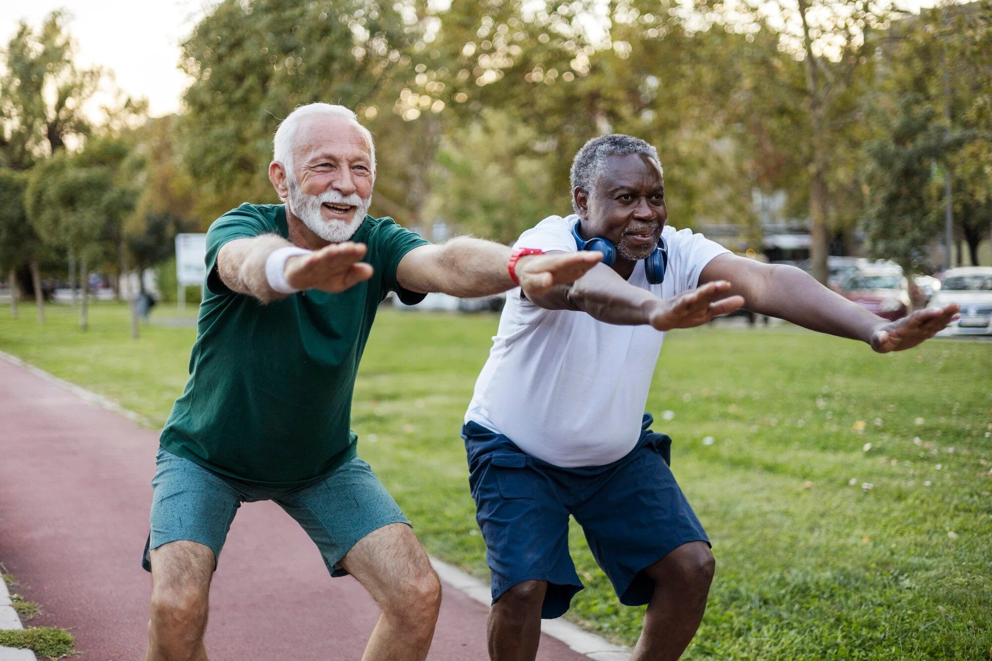 Two men doing squats